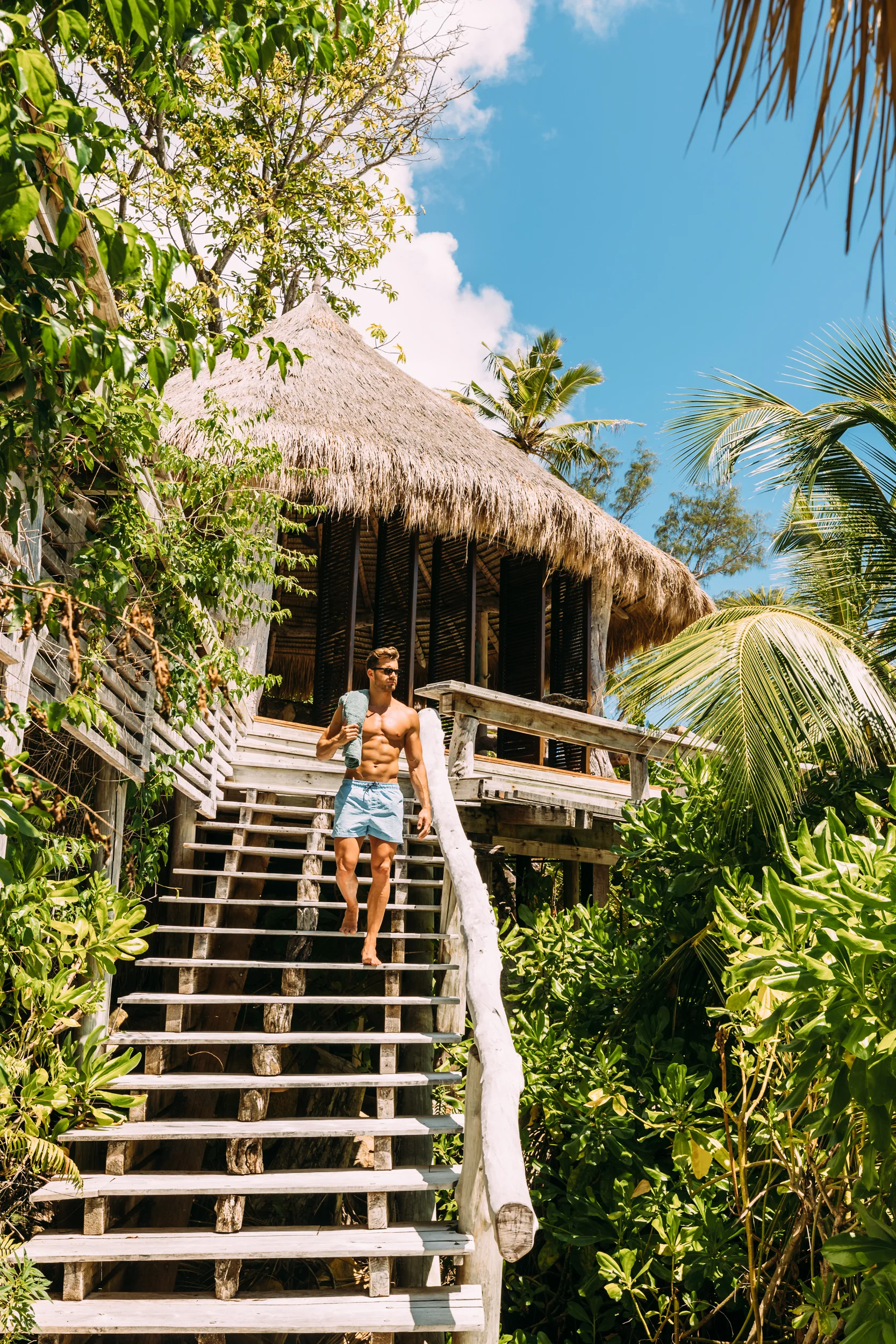 North Island - Villa 11 - Guy on Stairs - 2500px.jpg