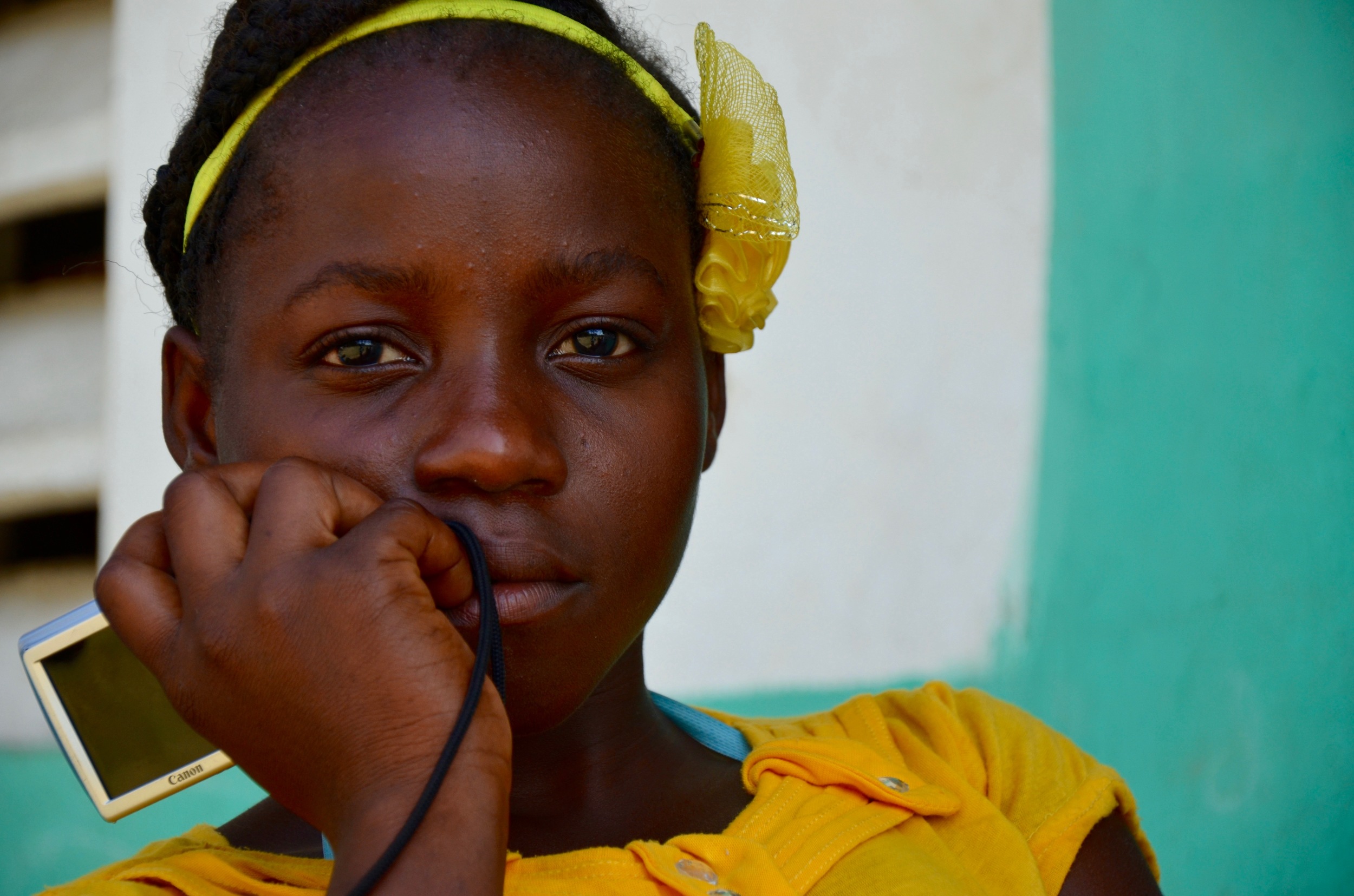 On March 18th, 2016, I traveled to Port- Au- Prince, Haiti and met up with Kathryn Adams, Executive Director of the Lidè Foundation . As the website states, " Lidè is an educational initiative in rural Haiti that uses the arts and literacy to empower at-risk adolescent girls and help them transition into school or vocational training." I traveled there as a guest teacher for 11 days for the purpose of teaching the girls (and teachers) about photography and portraiture. Based out of the city of Gonaïves, we traveled daily to rural communities where the program works with adolescent girls on an ongoing basis . Culturally, the female, including the youth, have huge responsibilities (ie. cook, clean, do laundry, make charcoal, farm, and child care, among others). Typically, these girls do not have any down time. To know what it means to simply be a child and explore creatively is virtually non existe nt. Thus Lidè. They have an ongoing program in 7 (soon to be 8) locations throughout Haiti. They are giving these girls the freedom to hear their inner voice and to find out who they truly are through the arts.