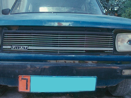 The front end of the ol’ 127 took a lot of shots that year. Can you see the “lady eye” stickers on the headlights? Classy? By the way, I erased the license number in case I owe somebody else some money.