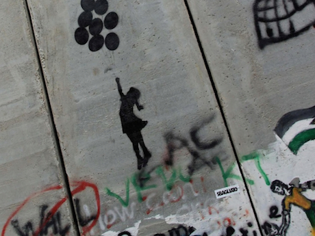 A copy of “Balloon Girl” by Bansky. Graffiti on the inside of the Great Barrier Wall. Bethlehem, Palestine.