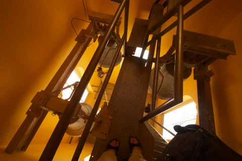 Climbing through the bells.