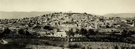 View to Suffuriyyah from the south. The large structure on the top of the hill is a Crusader-era fortress. It was used as a school by the local inhabitants. Source.
