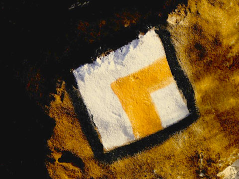A Jesus Trail Blaze. This one tells the happy wanderer that the path is turning to the right .