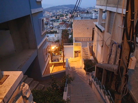 The urban trail out of Nazareth. Note the distinctively shaped hill on the horizon .