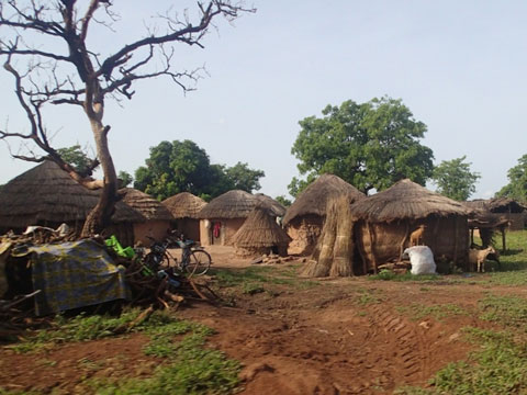 A traditional village in northern Ghana. Homes are constructed of mud and thatch.