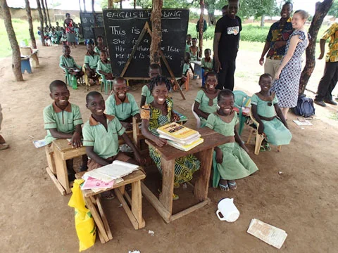 An open air “school house” of three “rooms” managed by one teacher.
