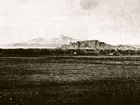 View to the Citadel at Van. Note the promontory rising from the plain. Image from H. F. B. Lynch, Armenia Travels and Studies II (1901: Fig. 138).