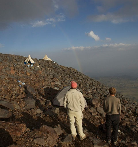 Keith and Tanner look at the rainbow over High Camp.