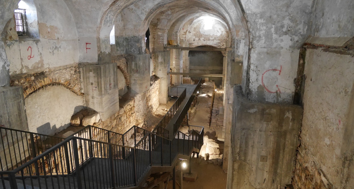 Note the old bars on the window (left). Poured concrete piers and the occasional I-beams stabilize the Kishle’s shell.