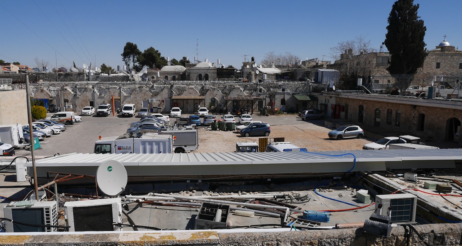 View through the razor wire on the Kishle roof to the police compound.