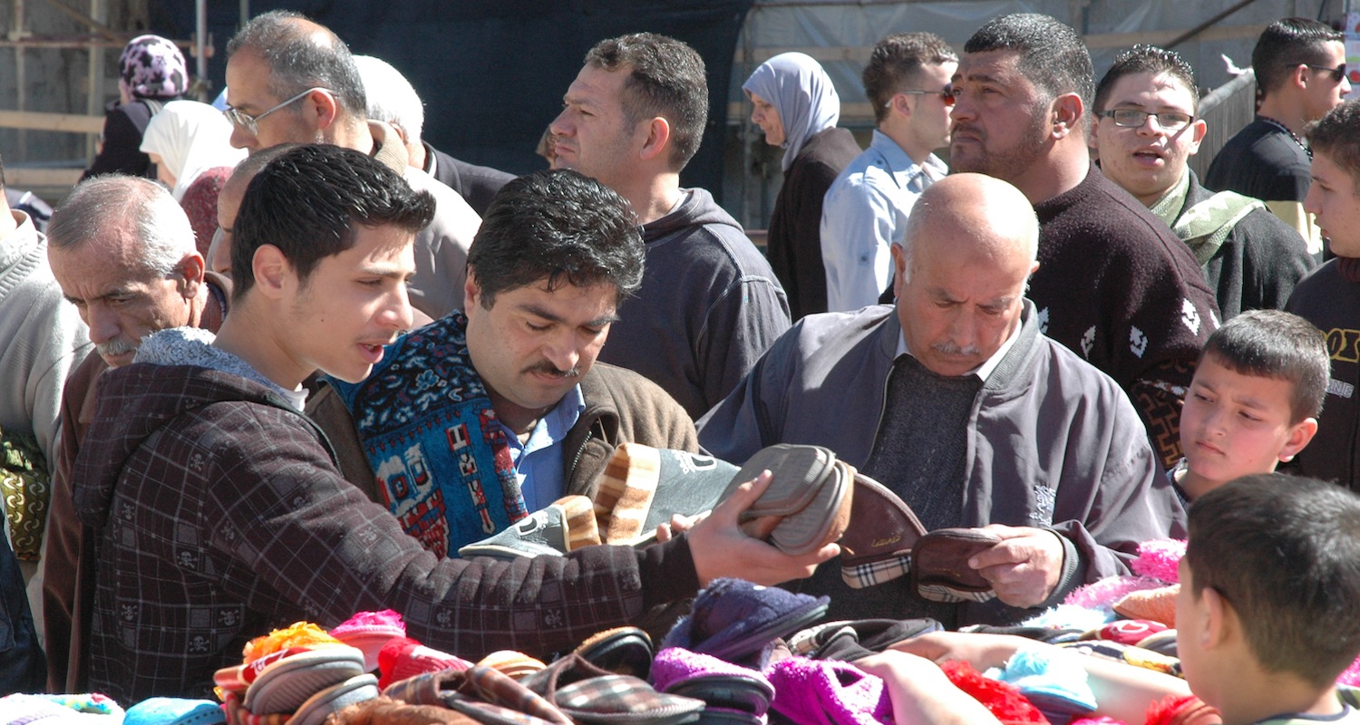 East Jerusalem shoppers check shoe bottoms for the Niobium markings.