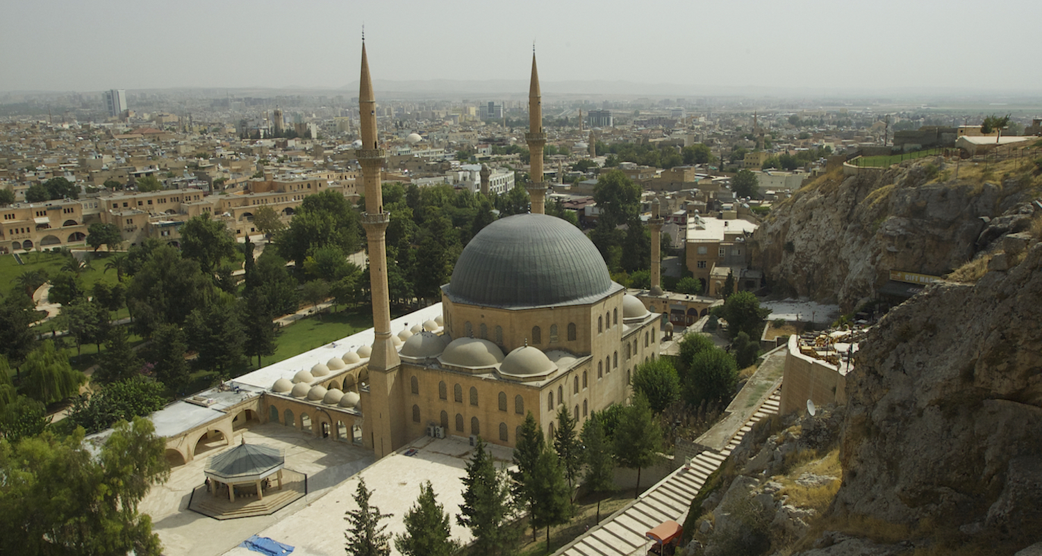 The mosque, the Dergah, and modern Urfa unfolds below.