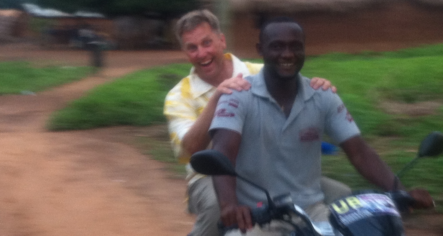 Joyriding through the village of Gulubi with James.