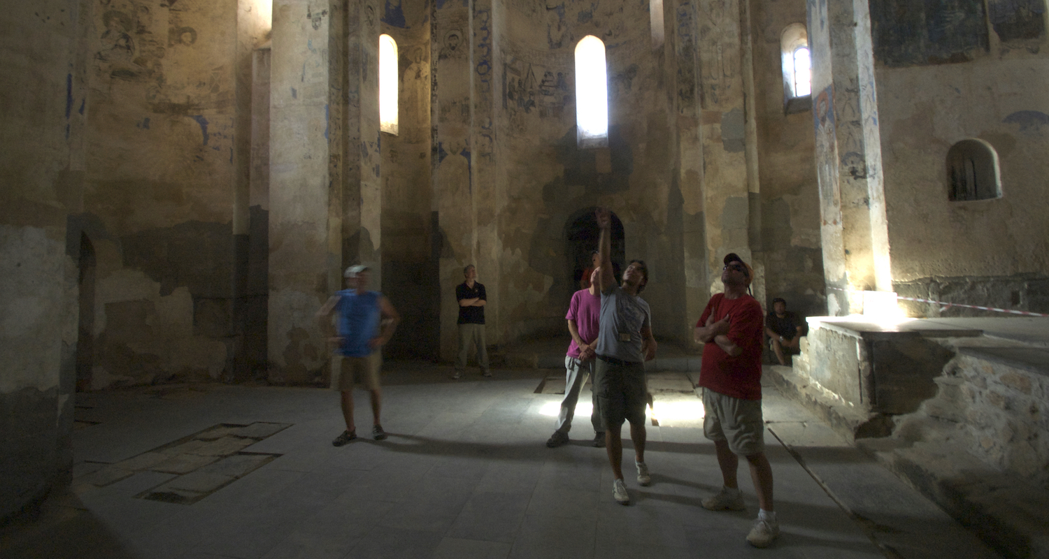 Inside the Church of the Holy Cross. We marvel at the artistry.