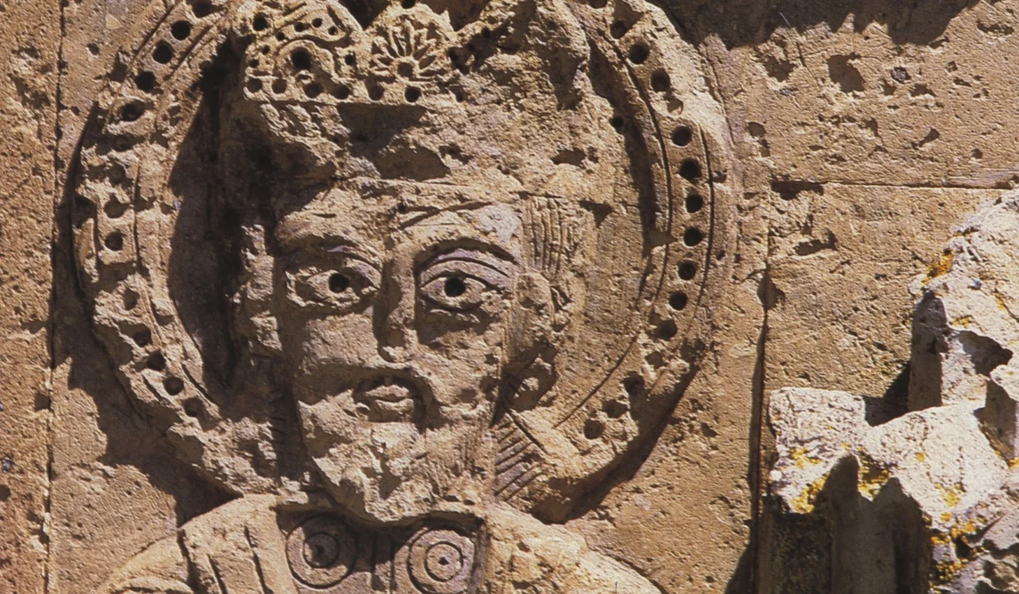 King Gagik pictured on the Western facade of the Church of the Holy Cross. Image from Mnas’akanian (1986: plate 2). Donor portraits are often found on medieval Armenian churches.