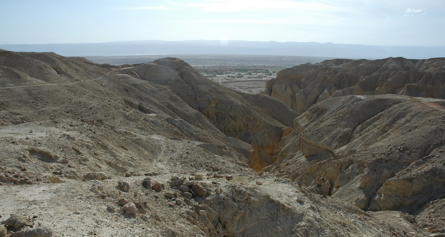 View to the remains of Bab edh ‘Dhra in Jordan. Tom Schaub and Walt Rast led an American team of excavators working at this site in the 1970s and early 1980s. The waters of the Dead Sea are visible on the distant edge of the plain. The hills of Judea rise beyond.