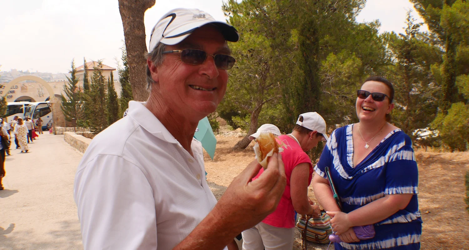Enjoying pastries at the Shepherds' Field in Bethlehem.