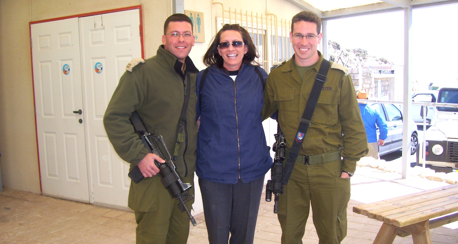 Susan, one of our pilgrims, poses with Israeli military.