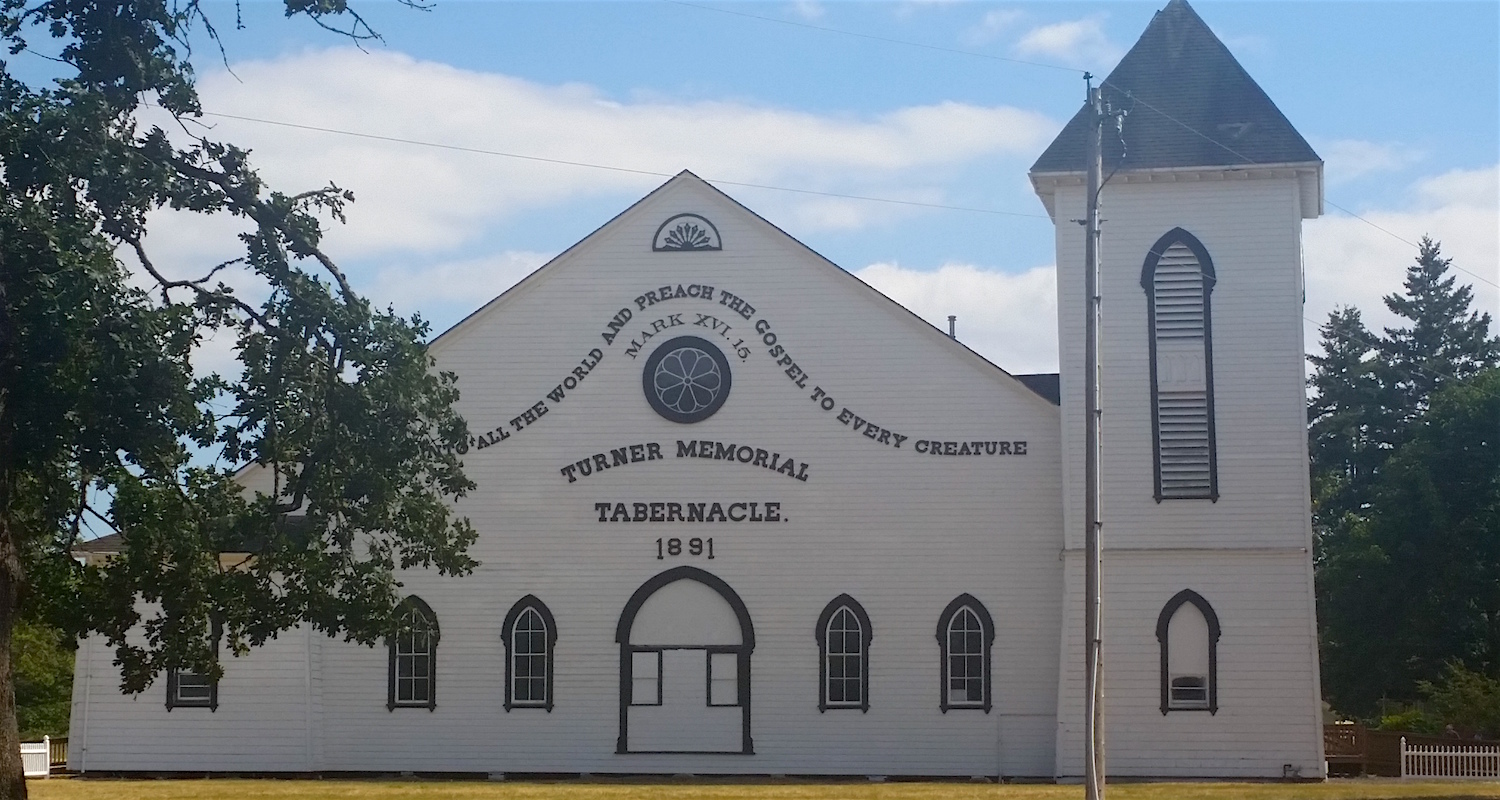 The tabernacle today. It wears a fresh coat of white paint and black trim. Note the missing tower on the left.