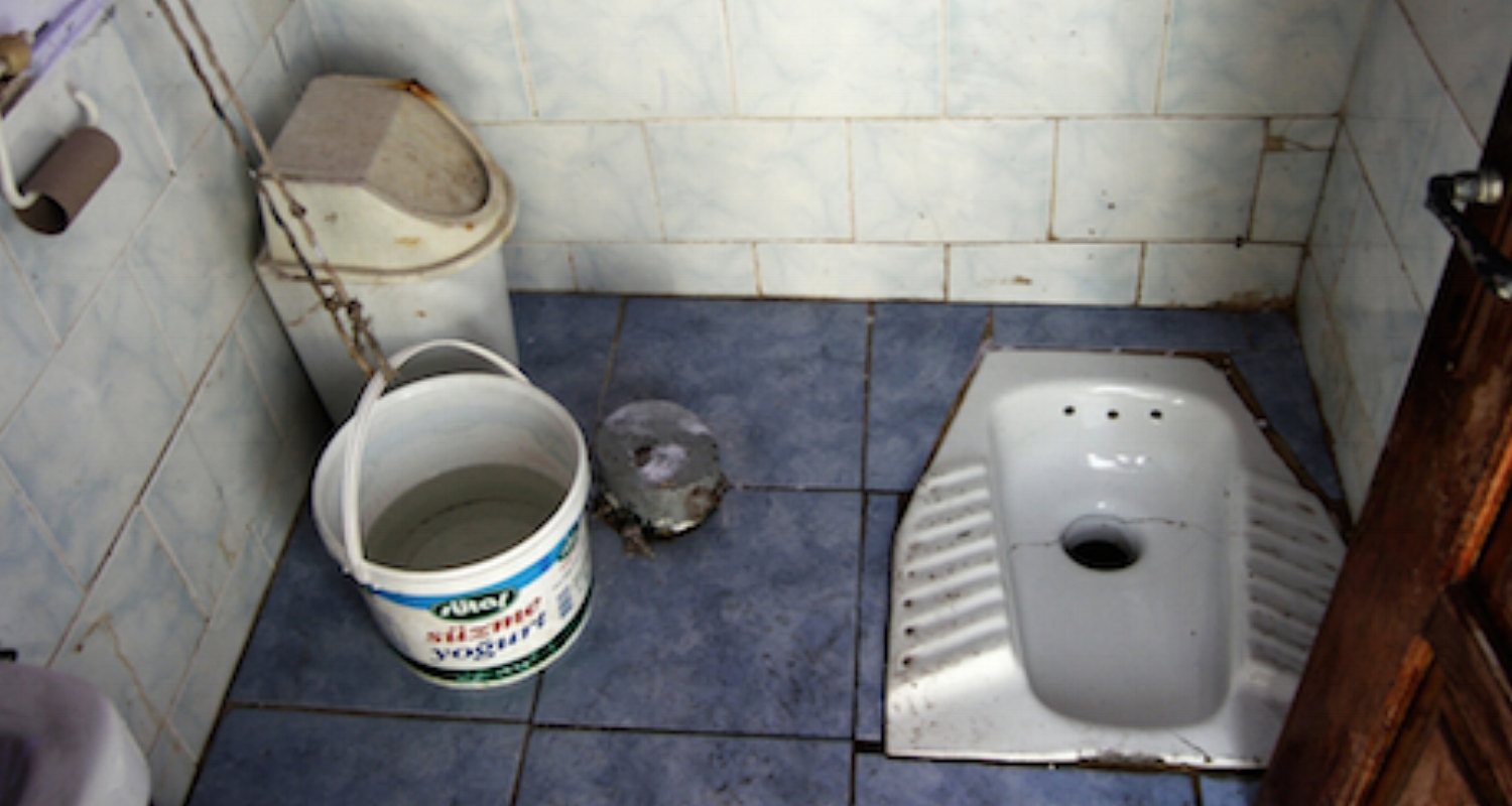 Nothing underlines this problem as clearly as the ever-popular “squatty potty” or “Turkish toilet.” These are widespread in rural and less “western” areas of the Middle East. Performing one’s duty at this station requires balance, ingenuity, and the careful manipulation of bottomside covers (i.e., let nothing touch the floor!). Note the empty toilet paper roll on the wall. This is the default position.
