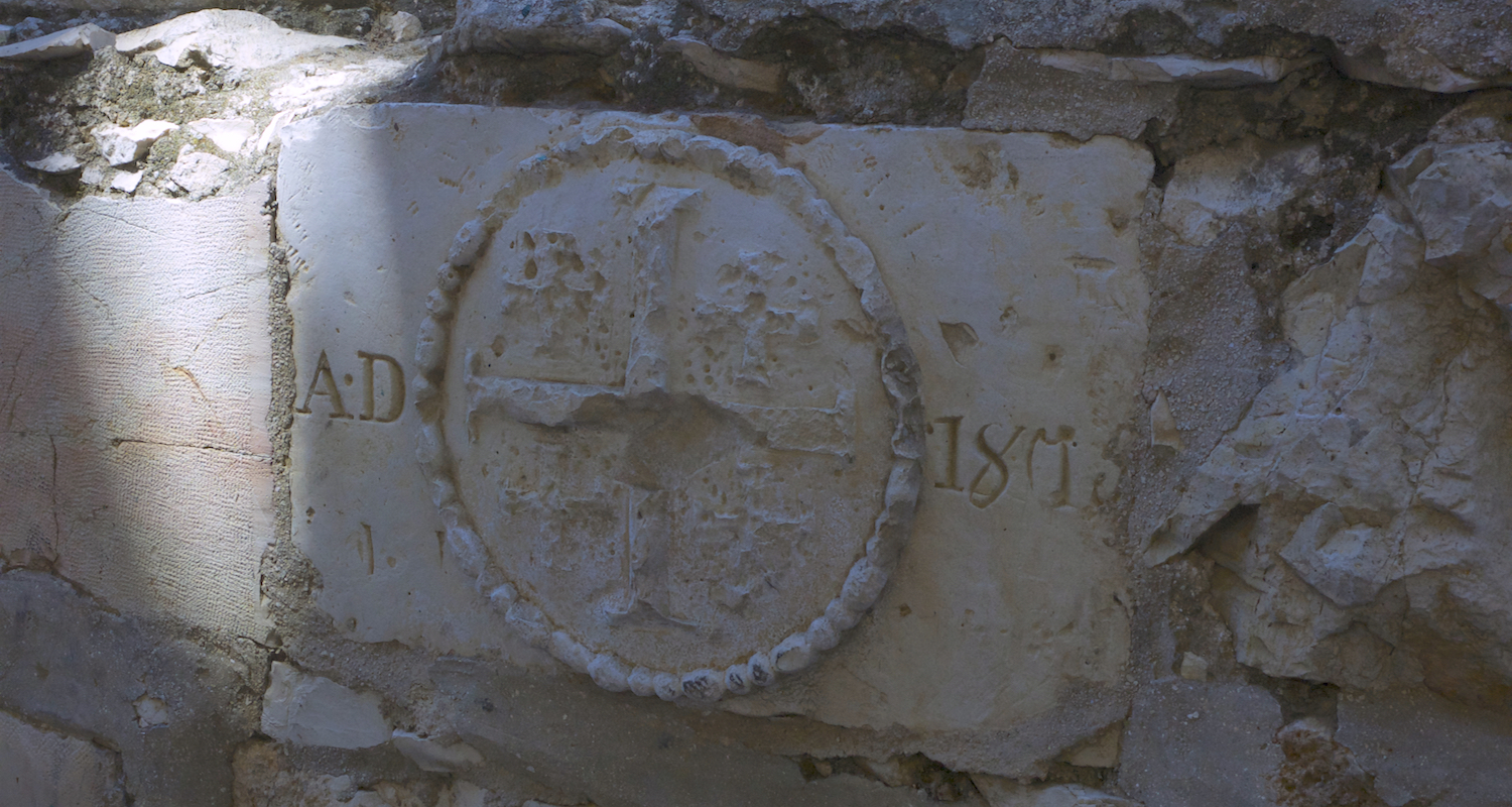 A carved medallion on a stone in the courtyard of the Church of All Nations. All Christians are welcome to this place which is held in trust by the Franciscan Custody of the Holy Land. Image by Mark Ziese.
