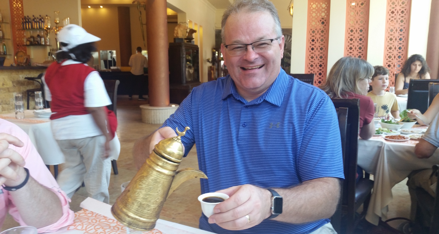 Mark pours a round of Arabic coffee.