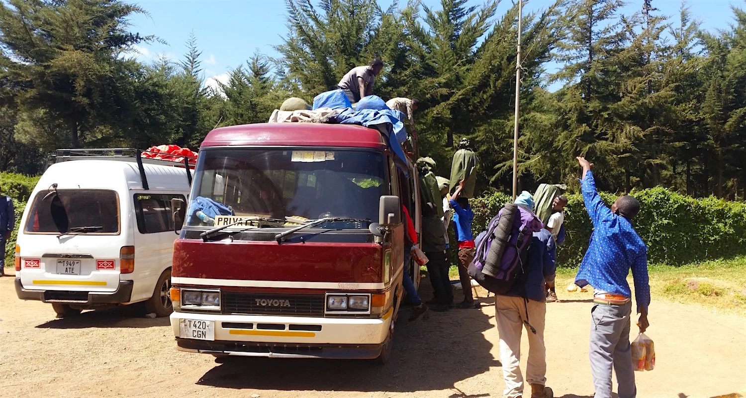 After the organized shuffle, all bags were reloaded on the top of the bus.