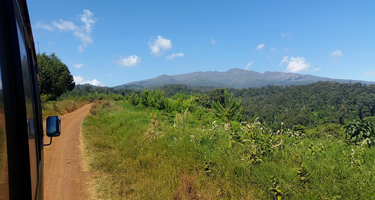 The Shira Ridge, the remnant of Kilimanjaro's most ancient volcanic crater, dominate the horizon. Our destination was at its base.