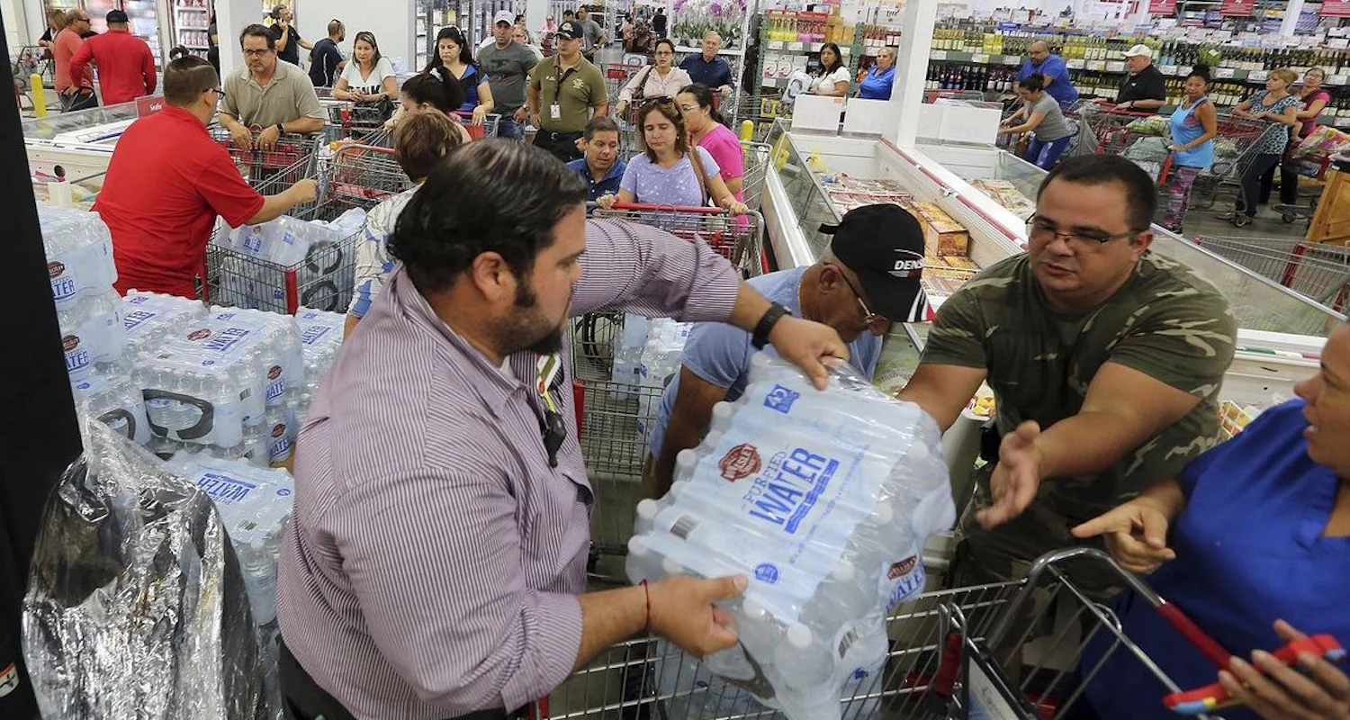 Residents purchase water in Miami. Image from here.