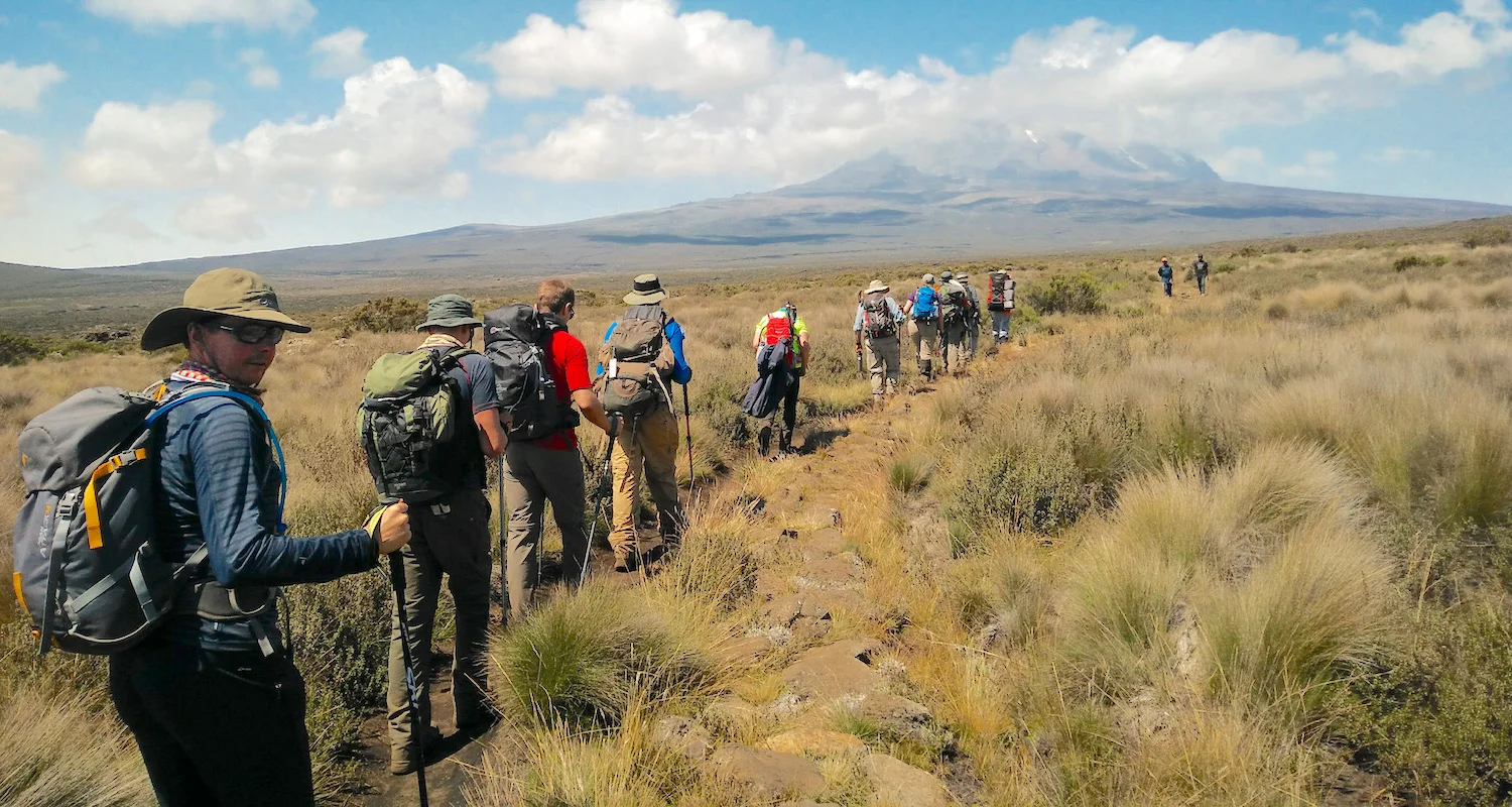 Trekking across the caldera known as the Shira Plateau. Our noses are pointed to Kibo. Photo by teammember Nico Roger.