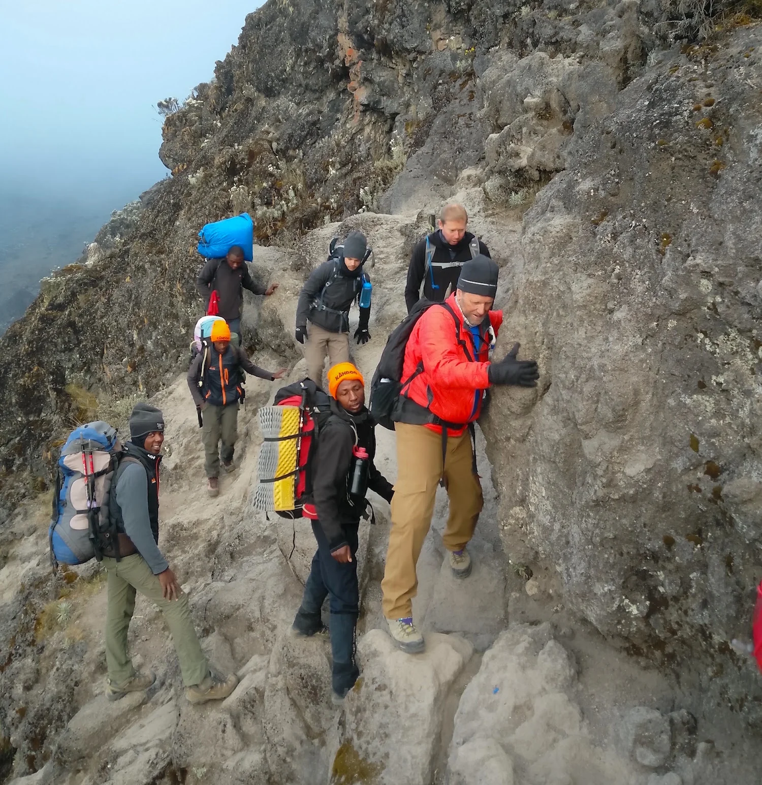 Yours truly on the wall. The line is easy to follow. Godfred was a reassuring presence, offering advice on footwork and handholds. Photo by teammember Nico Roger.