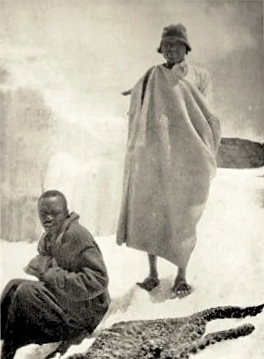 Jonathan, Mikani, and the remains of a frozen leopard on Kilimanjaro, 1926. Image from here.