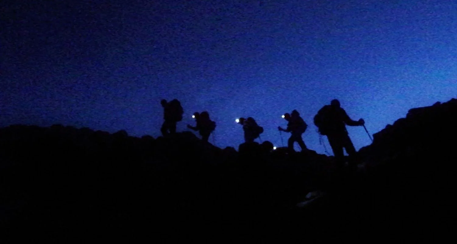 Climbing by headlamp has special challenges (and benefits). Image from here . 