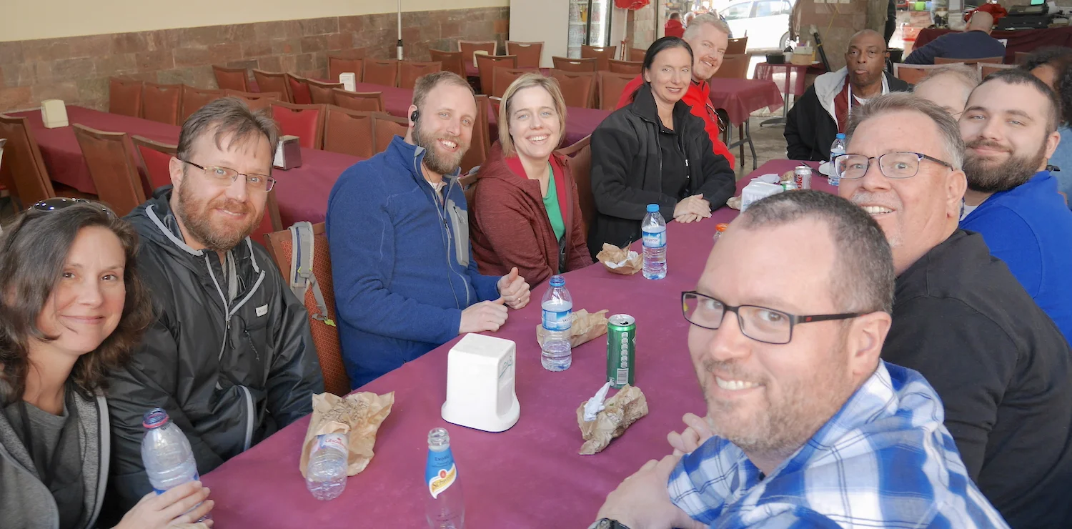 Didi and Shannon (far left) enjoy a shwarma stop in Nazareth with our 2018 Fam Group.