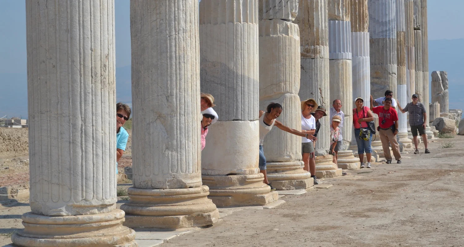 Members of our 2013 study tour to Turkey play hide and seek among the restored columns of Laodikea. Photo by Bible Land Explorer Adam Chambers.