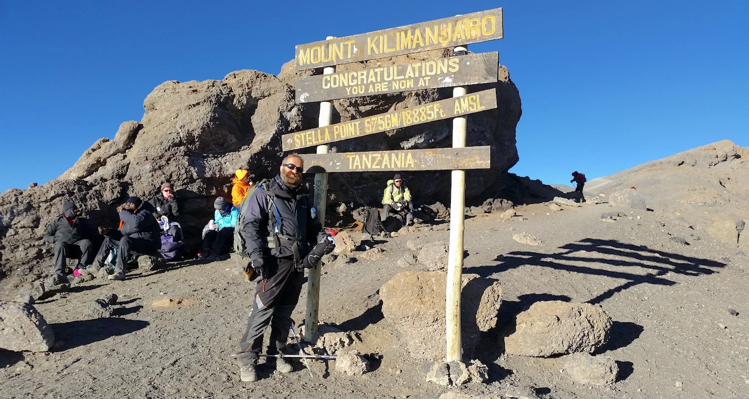 Jason stops at Stella Point on the descent from the rim of Kibo.