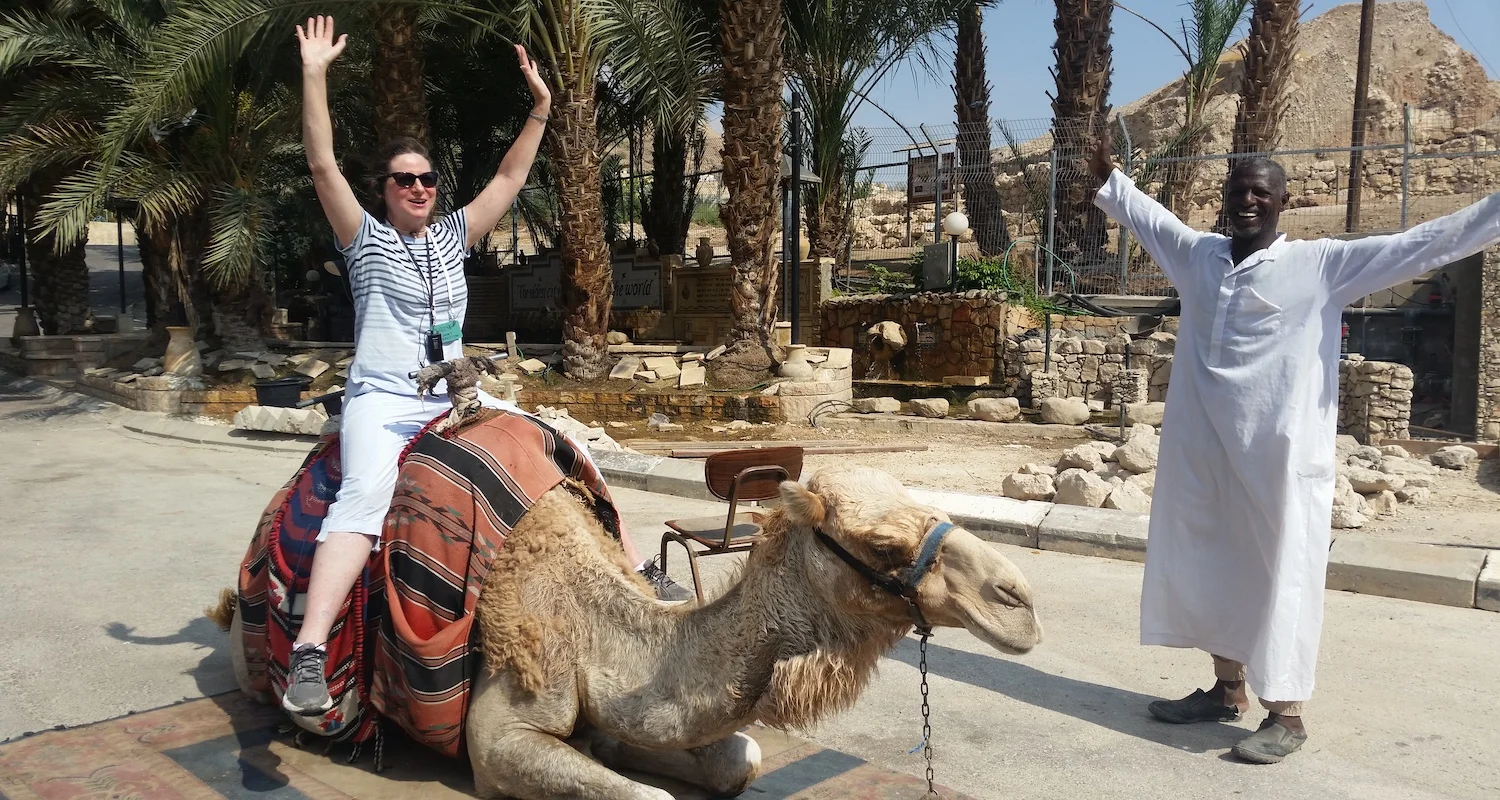 Janet wings it on a camel in Jericho.