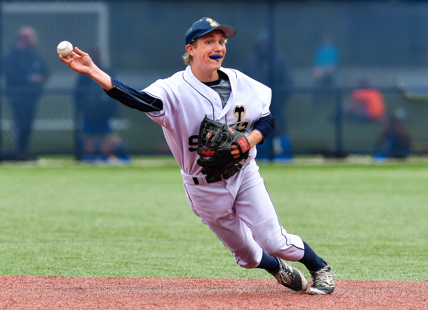 Nikon D500, 1/2000 @ f/4, ISO 250, 300mm Lynnfield shortstop Jonathan Lunders throws the ball to first base after fielding a ground ball during their game against Pentucket at Lynnfield High School.