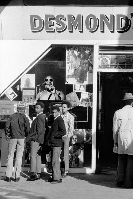 GB. ENGLAND. Brixton. School children outside Desmond's Hip City record shop in Brixton. 1973.
