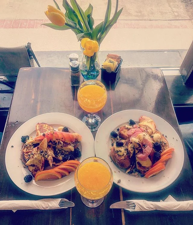 Our go-to handyman/knife sharpener/delivery/all around awesome guy Tim came in for breakfast today with his wife  Kim,who loves our Challah French toast! @tanith_nz asked if she could take a photograph of their table as they enjoyed our &ldquo;Mom&rd