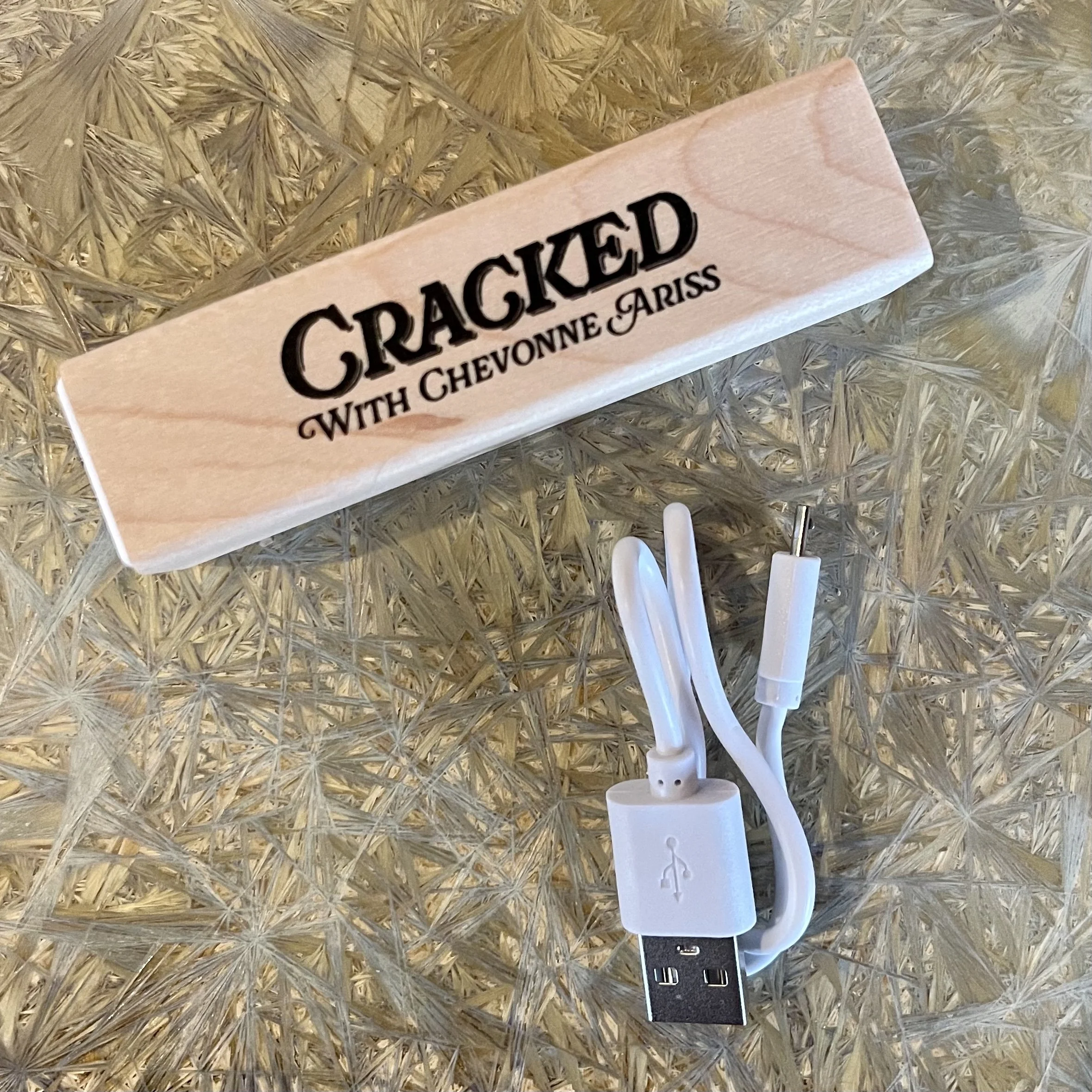 crackedphonebatterywithcord.jpg