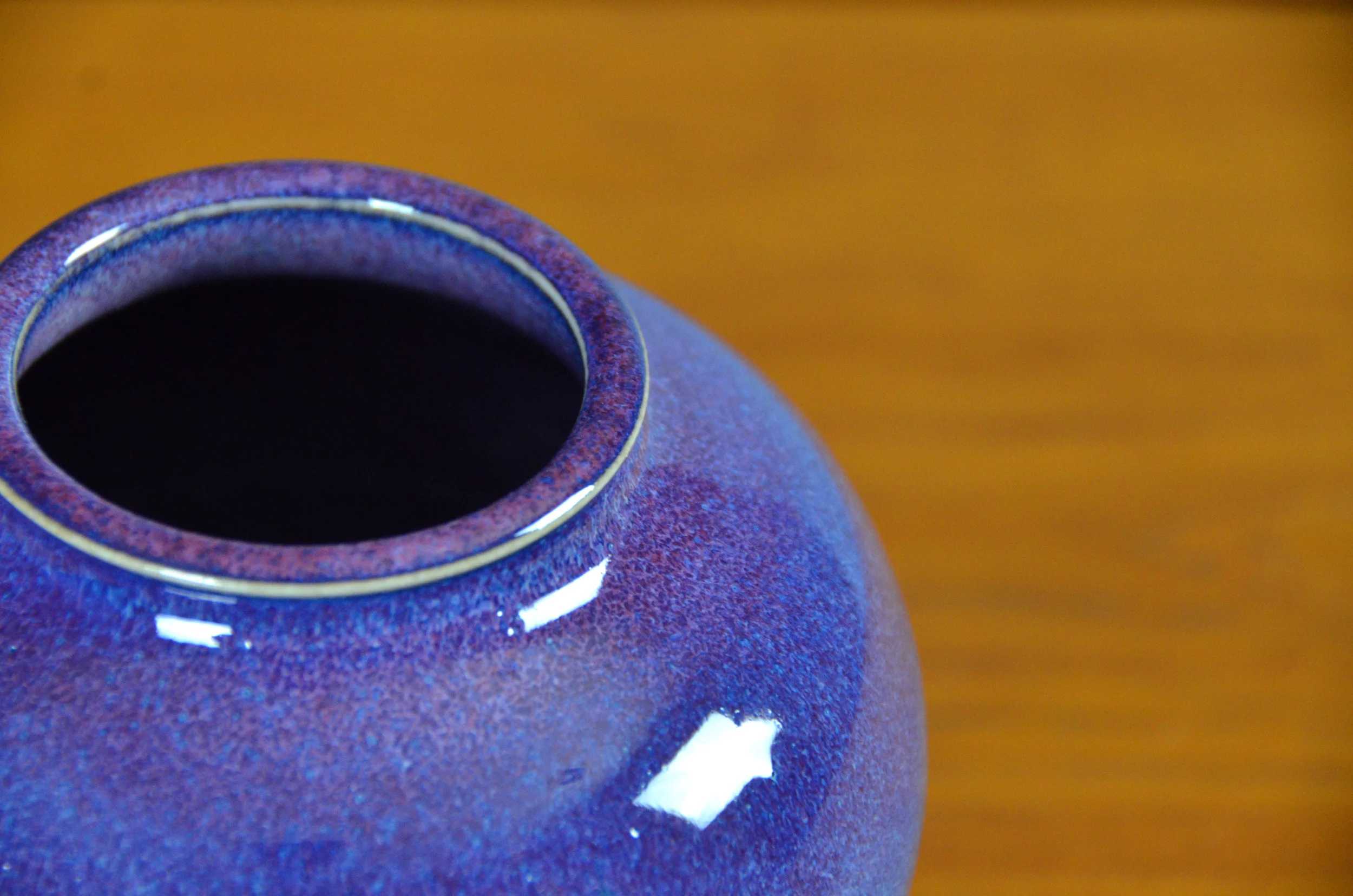 Porcelain Purple Vase | Hand thrown porcelain on a potter's wheel. High Fired, Cone 10, Lipstick Purple Glaze, Hand Trimmed, Ceramic | Caldwell Pottery