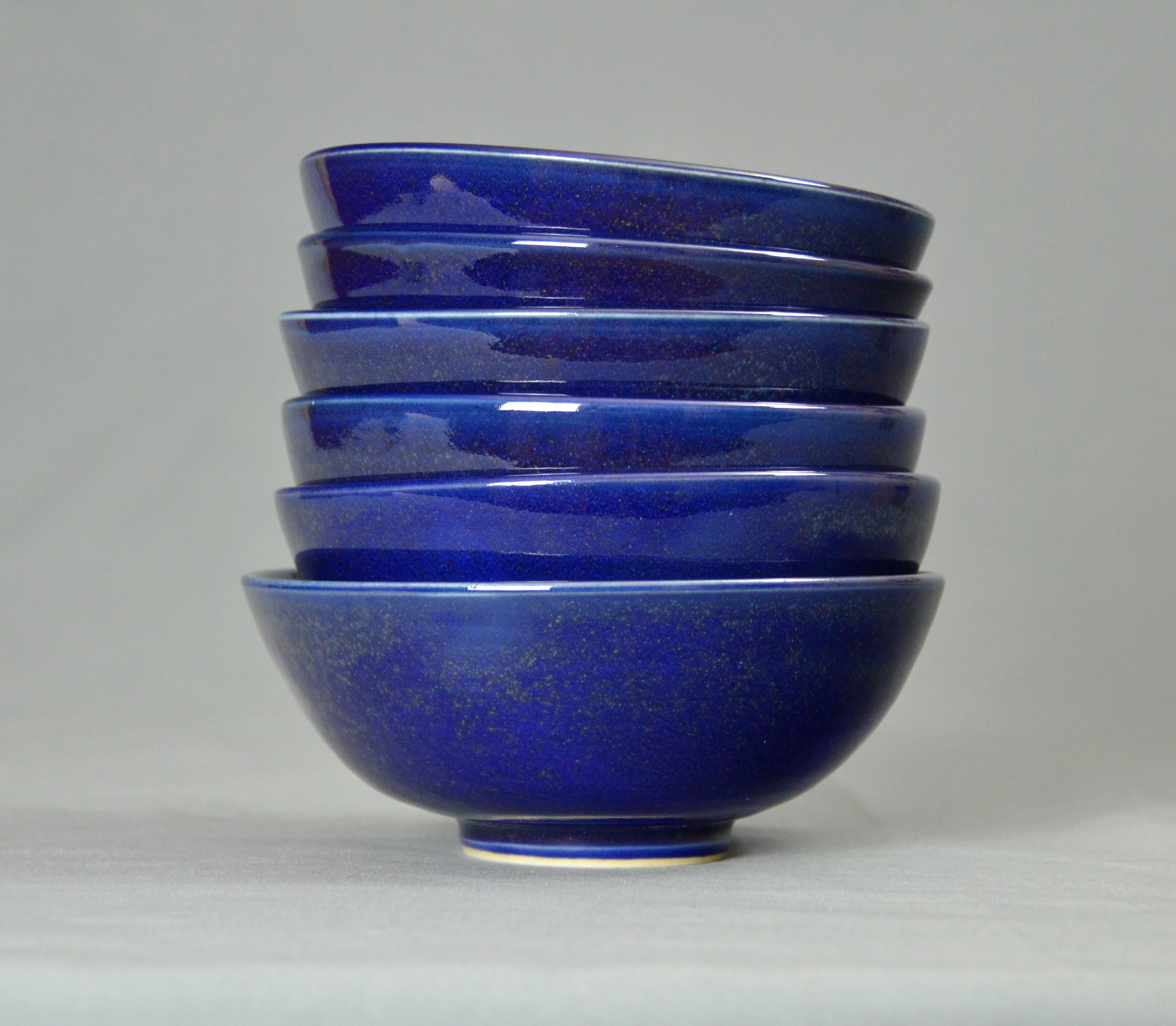 Porcelain Blue Japanese Bowl Set | Hand thrown porcelain on a potter's wheel. High Fired, Cone 10, Flambe Blue Glaze, Hand Trimmed, Ceramic | Caldwell Pottery