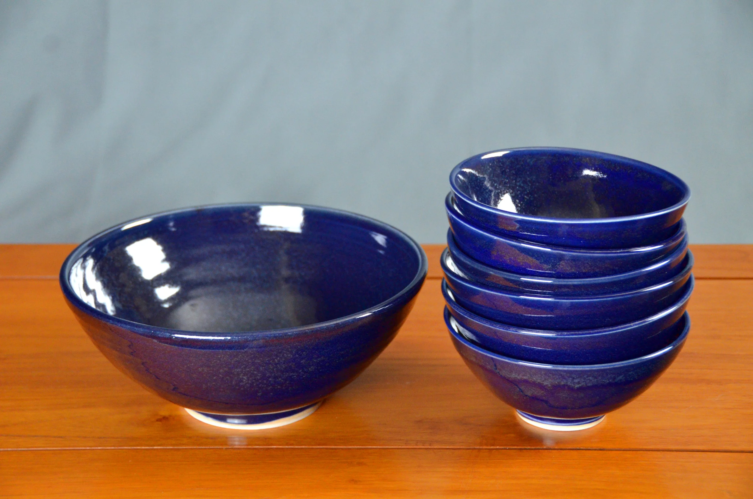Porcelain Blue Japanese Bowl Set | Hand thrown porcelain on a potter's wheel. High Fired, Cone 10, Flambe Blue Glaze, Hand Trimmed, Ceramic | Caldwell Pottery
