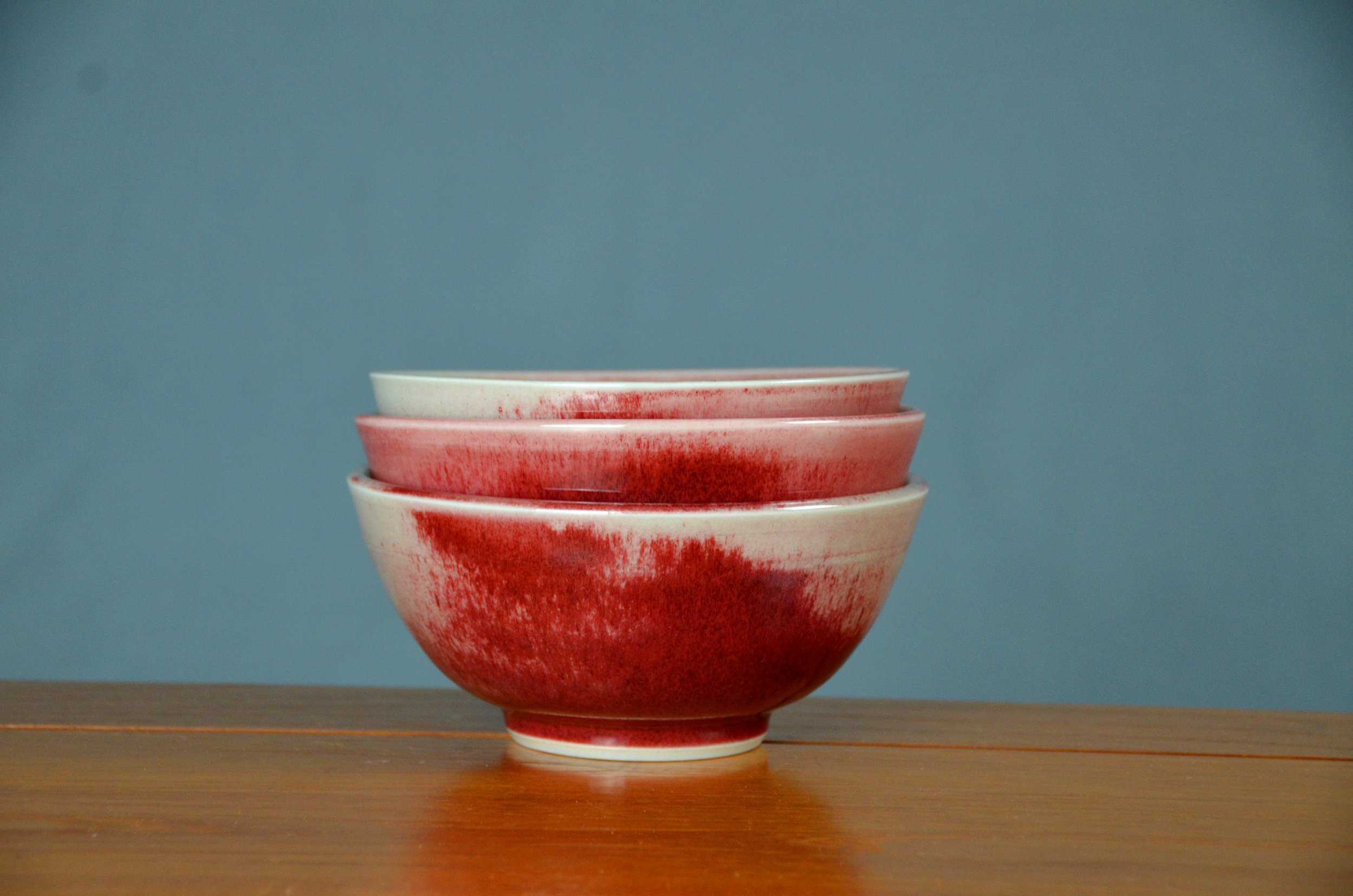 Porcelain Red Japanese Bowl Set | Hand thrown porcelain on a potter's wheel.  High Fired, Cone 10, Vegas Red Glaze, Hand Trimmed, Ceramic | Caldwell Pottery