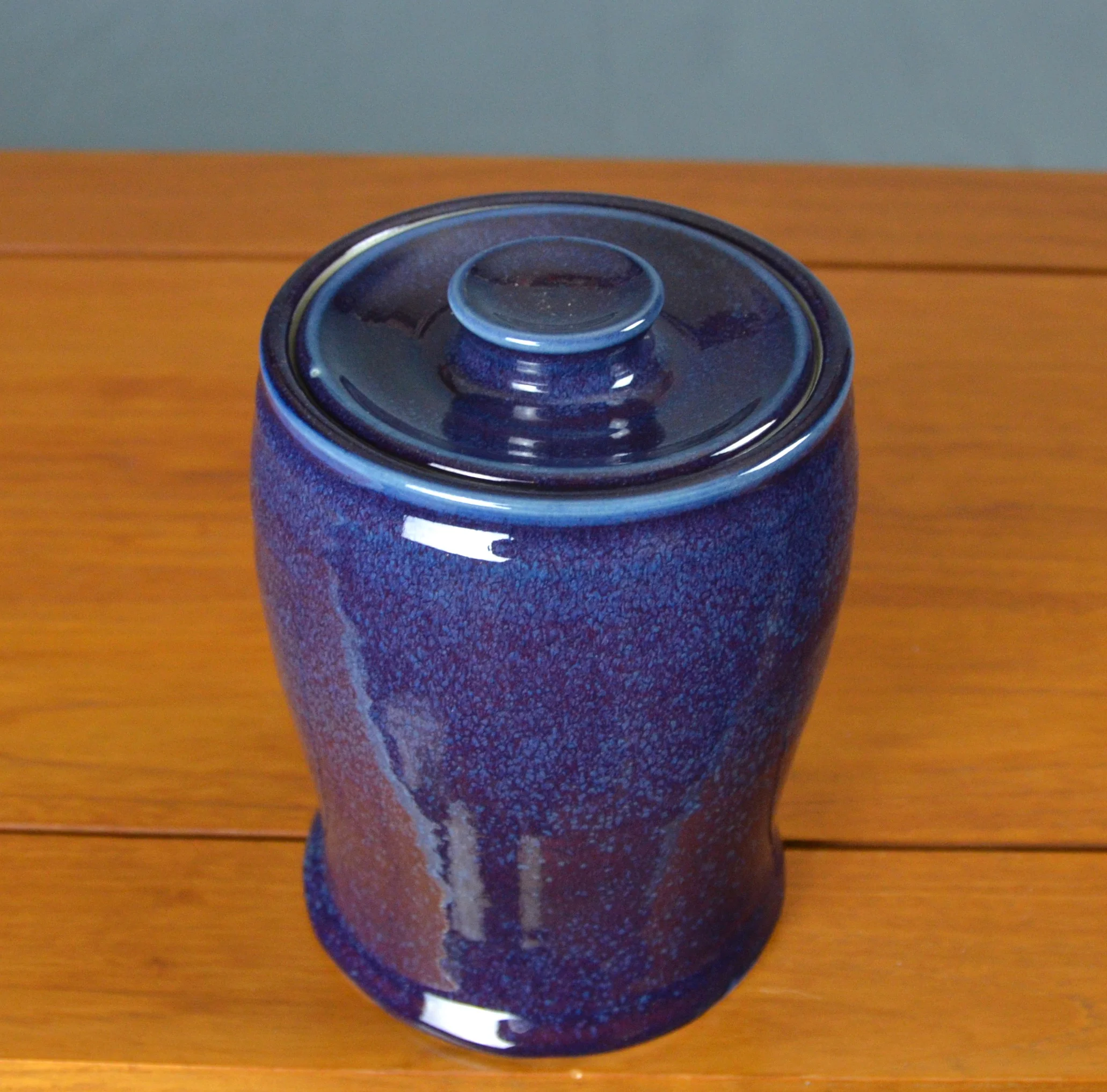Porcelain Blue Purple Lidded Jar | Hand thrown porcelain on a potter's wheel. High Fired, Cone 10, Lipstick Purple Glaze, Hand Trimmed, Ceramic | Caldwell Pottery