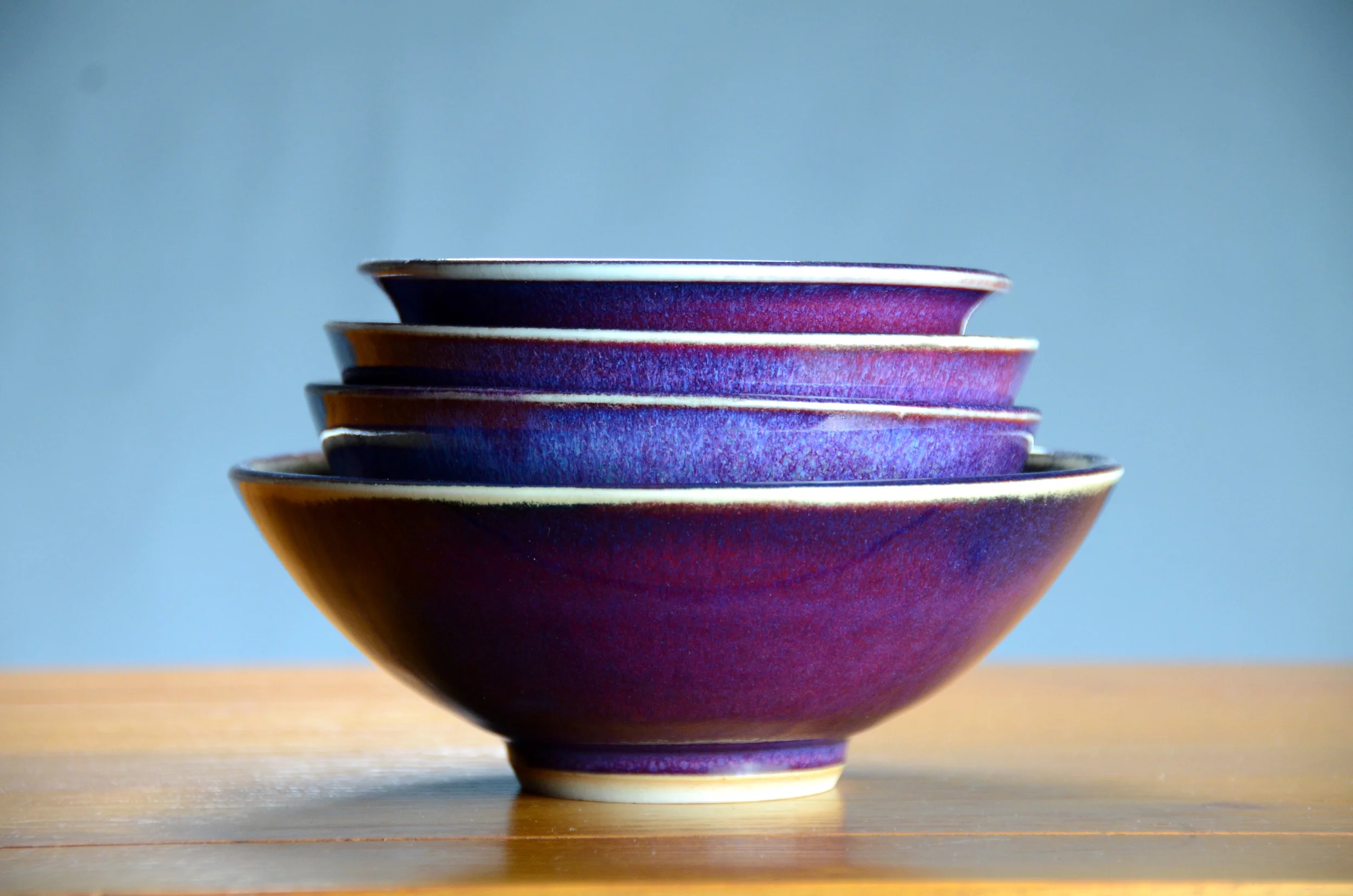 Porcelain Purple Japanese Bowls | Hand thrown porcelain on a potter's wheel. High Fired, Cone 10, Lipstick Purple Glaze, Hand Trimmed, Ceramic | Caldwell Pottery