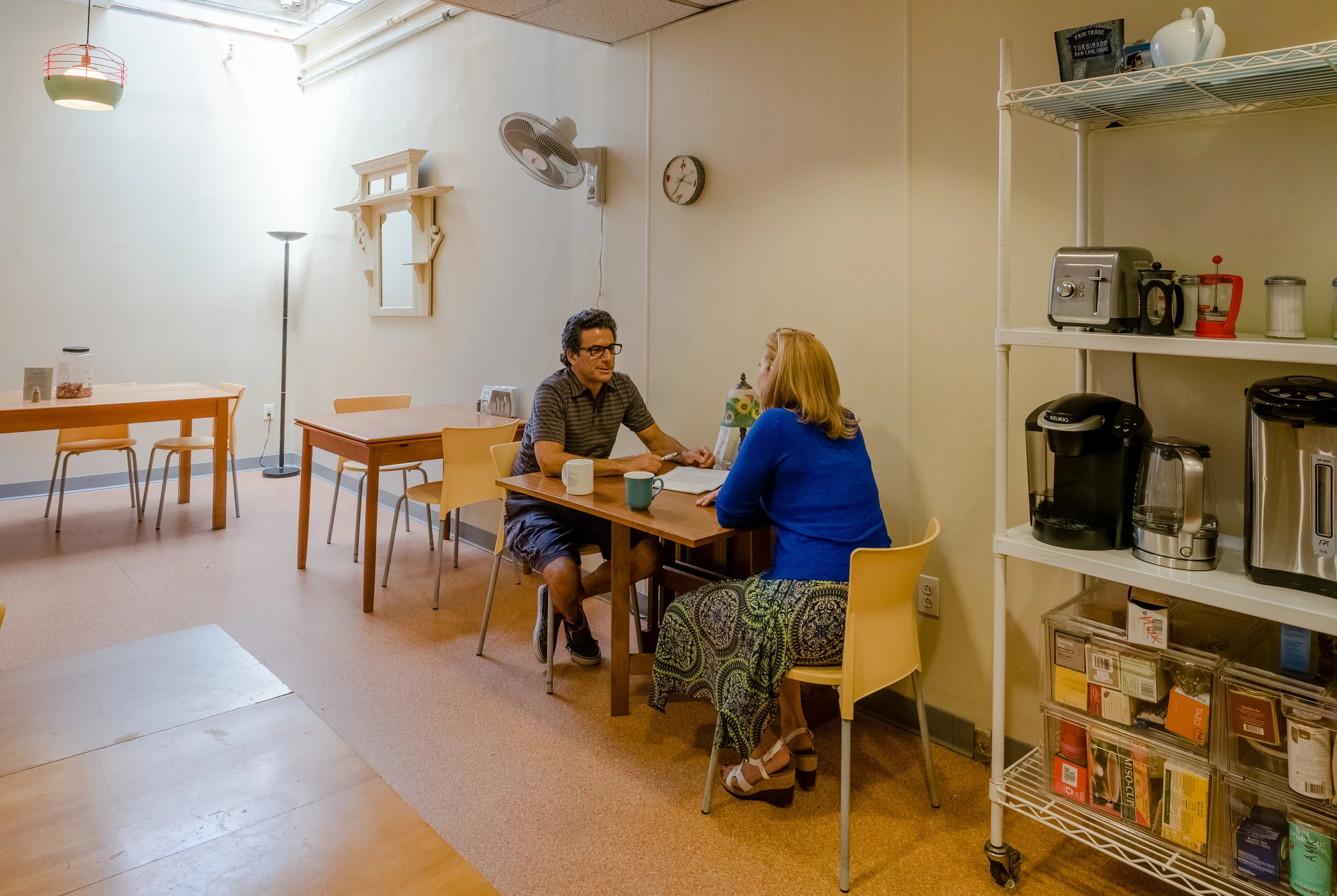 An adjacent coffee room and eating area assure that the shared writing space remains clean and quiet.