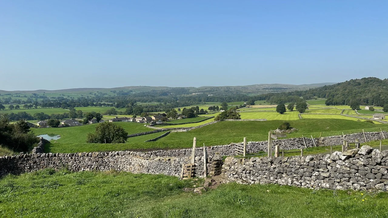  Leaving Grassington. This is a typical landscape along this section with stone ladders over the stone fences through farmland.  