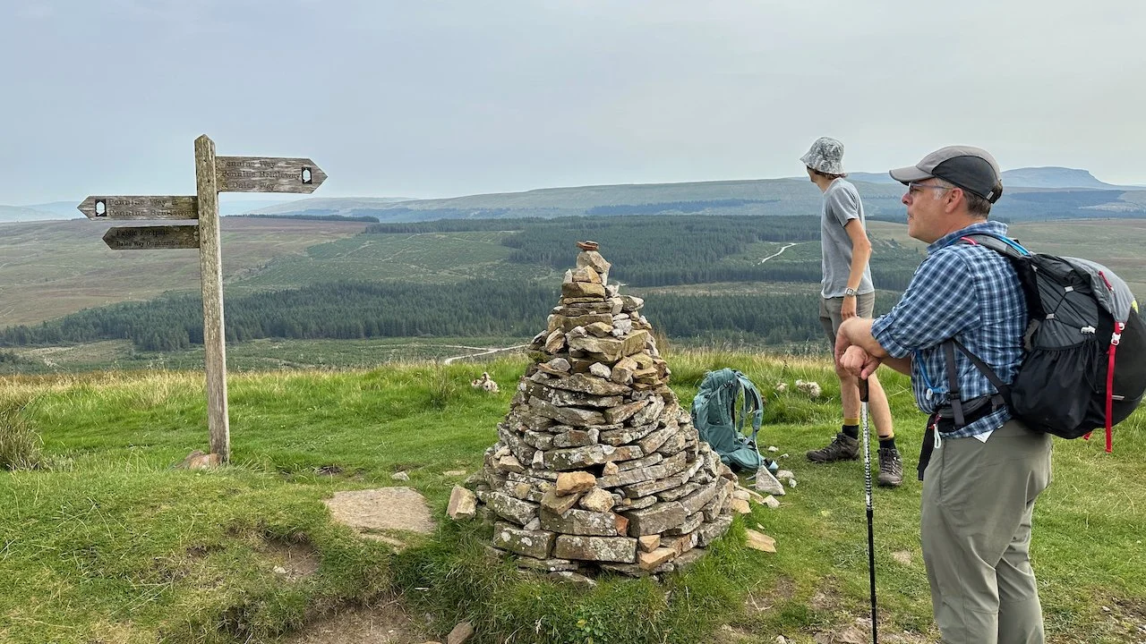 The cairn at the highest point, where The Dales Way meets The Pennine Way. Oscar was also hiking with us for part of this day. 